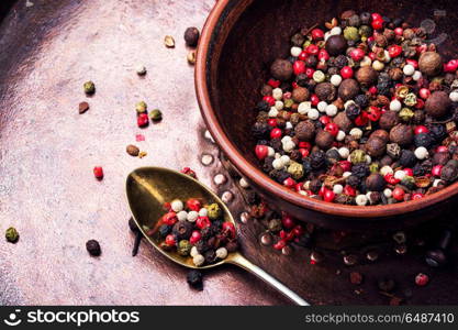 Mixed of peppercorn. set of peppers and a mill for grinding seasonings and spices