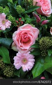 mixed pink floral arrangement with waterdrops