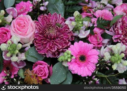 Mixed pink flowers in a floral arrangement