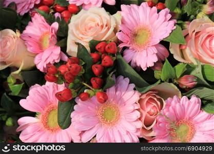 Mixed pink flowers in a floral wedding decoration