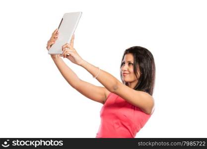Mixed race african woman taking selfie self photo.. Young fashion mixed race african woman girl taking selfie self photo picture with tablet. Modern technology.
