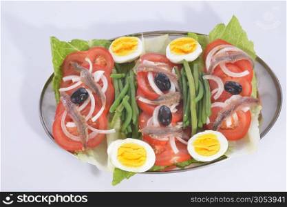 mixed salad in front of white background