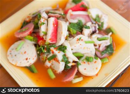 Mixed spicy salad With squid and vegetables with spicy component.