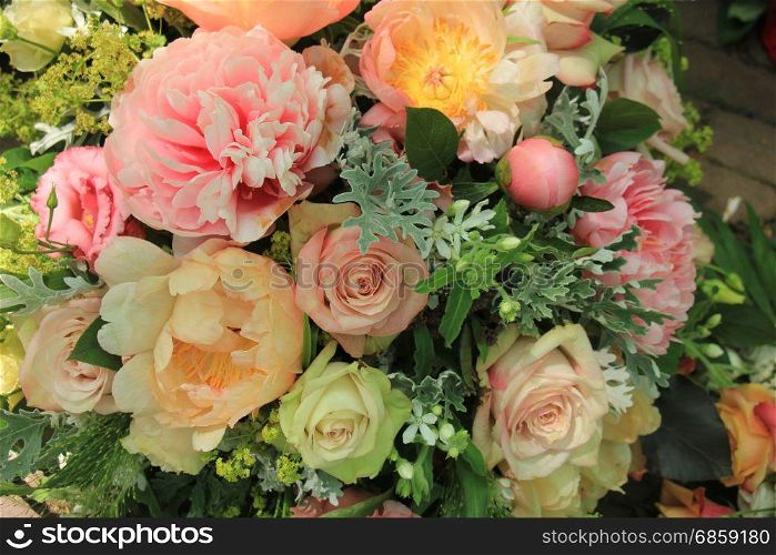 Mixed spring bouquet: roses and peonies in pale pink colors