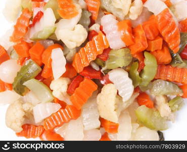 Mixed vegetables. Mixed vegetables as used in Russian Salad including carrots turnips courgettes zucchini cauliflower peppers celery onions olives