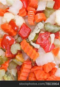 Mixed vegetables. Mixed vegetables as used in Russian Salad including carrots turnips courgettes zucchini cauliflower peppers celery onions olives