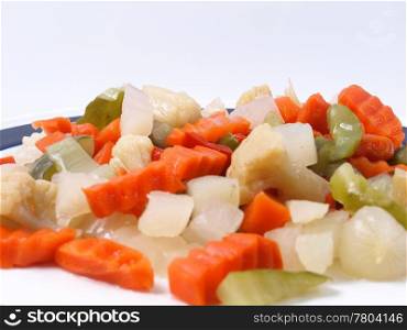 Mixed vegetables. Mixed vegetables as used in Russian Salad including carrots turnips courgettes zucchini cauliflower peppers celery onions