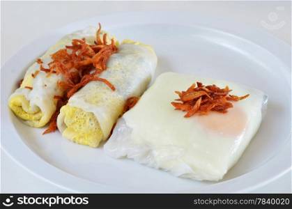 mixed vietnamese rice noodle rolls with a filling of pork sliced and egg , fried onion