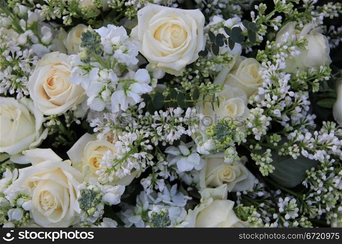 Mixed white bouquet with roses and other white flowers