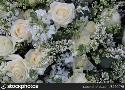 Mixed white bouquet with roses and other white flowers