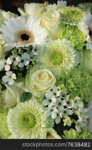 Mixed white wedding flowers, gerberas and roses