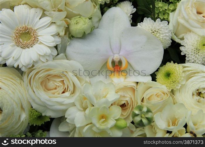 Mixed white wedding flowers, roses and phalaenopsis orchids