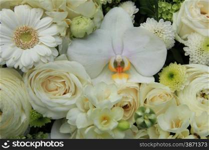 Mixed white wedding flowers, roses and phalaenopsis orchids