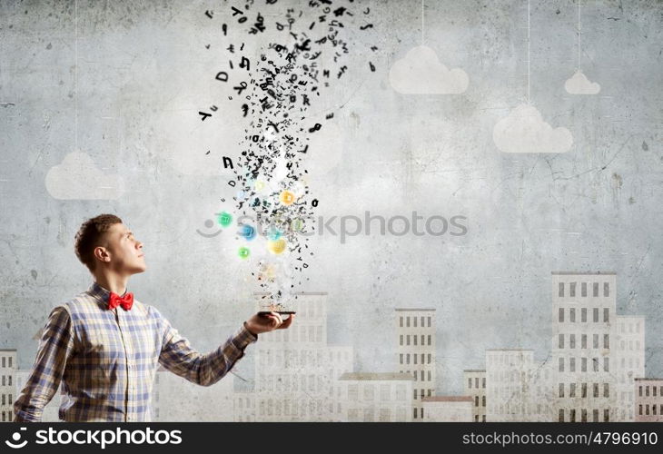 Mobile calls. Young man with mobile phone and colorful chat icons