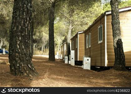 Mobile homes, brown bungalow in a camping.