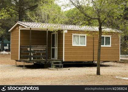 Mobile homes, brown bungalow in a camping.