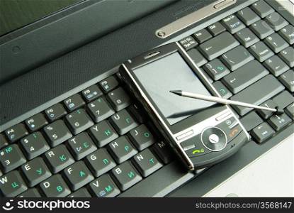 mobile isolated on a laptop