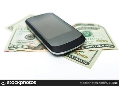 mobile phone and money on white