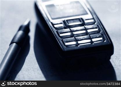 mobile phone and pen business background