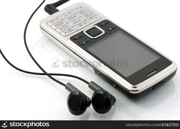 Mobile phone with earphones. Mobile music. Isolated on a white background