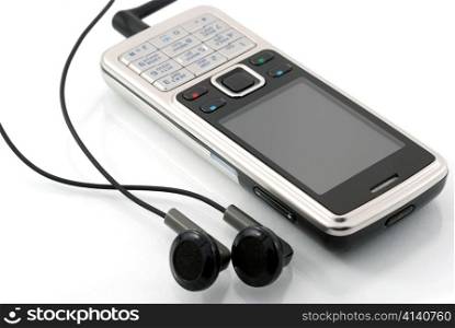 Mobile phone with earphones. Mobile music. Isolated on a white background