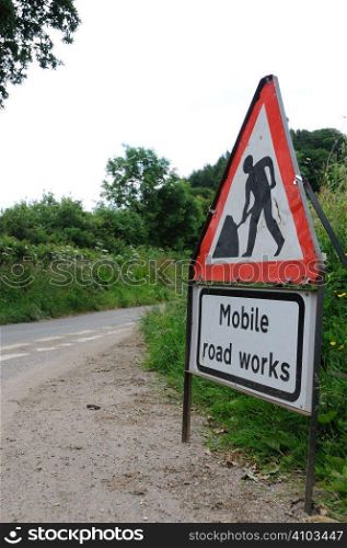 Mobile road works sign on a rural lane