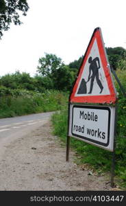 Mobile road works sign on a rural lane