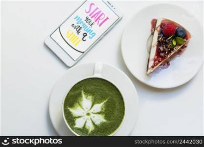 mobile screen with message screen matcha green tea cup cake slice plate white background