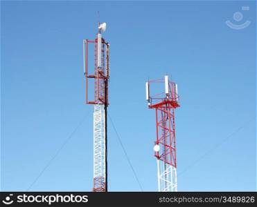 Mobile telecommunication technology antenna (radio antenne) for wireless mobile phone connections on blue sunny sky. Electrical wireless equipment concept