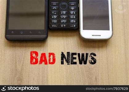 Mobile Telephones Text Concept Bad News - smartphone and old mobile telephone