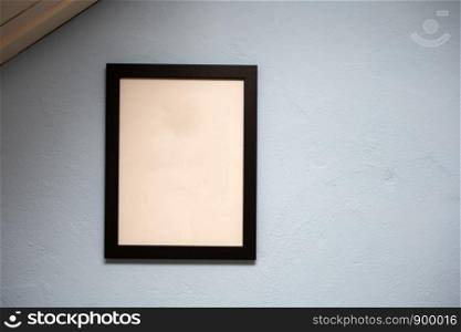 Mock up black frame on blue wall. background texture, space for text colorful. Mock up black frame on blue wall. background texture, space for text