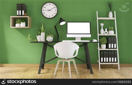 Mock up computer with blank screen and decoration in office green room mock up background.3D rendering