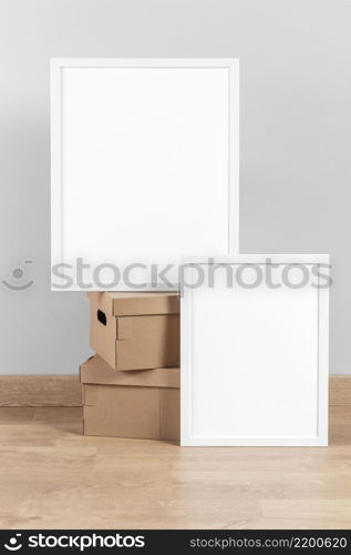 mock up frames beside cardboard boxes