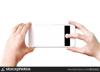 Mock-up of making photo on a smartphone - woman?s hands holding mobile phone and touching screen isolated on white background