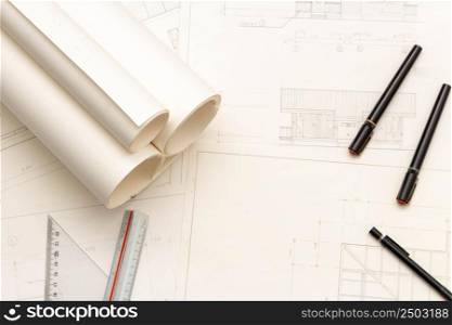 Mockup of architectural concept, Drawing tool and engineer drawing on blueprint with roll blueprint.