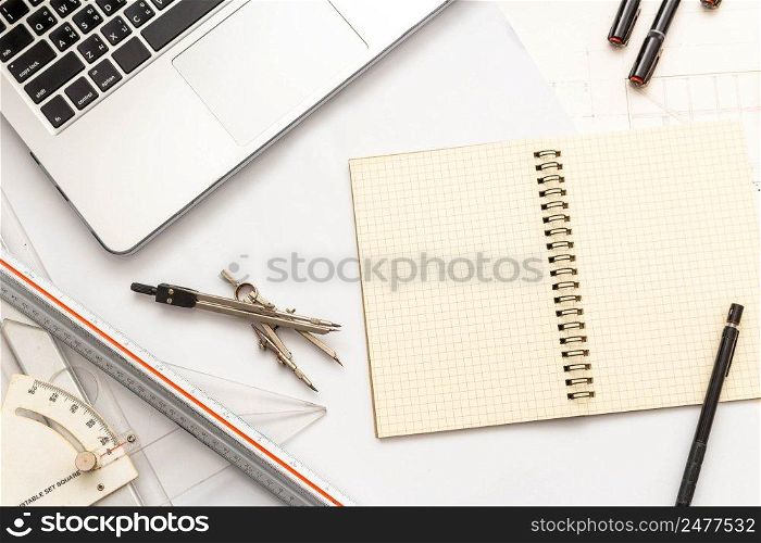 Mockup of architectural concept, Drawing tool on engineer drawing of blueprint and white background.