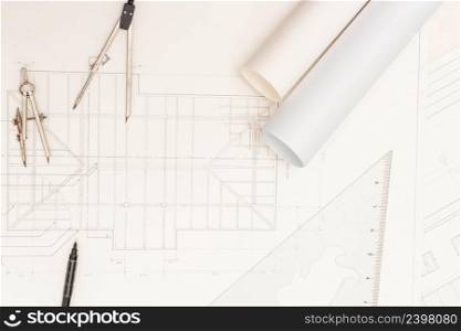 Mockup of architectural concept, Top view of drawing tools and engineer drawing on blueprint.