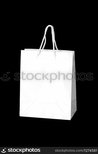 Mockup of paper shopping bag isolated on Black background
