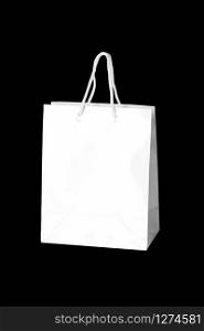 Mockup of paper shopping bag isolated on Black background