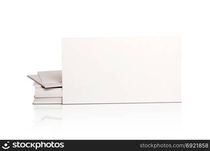 Mockup pile of blank white business cards isolated on white background