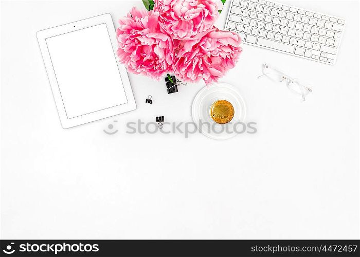 Mockup with digital Tablet PC. Feminine Home office workplace with coffee. Flat lay for social media blogger