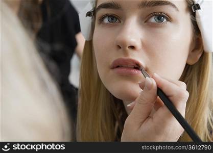 Model Having Makeup Applied