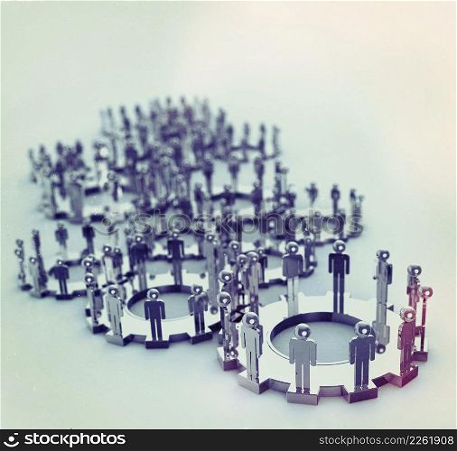 Model of 3d figures on connected cogs as industry vintage style concept