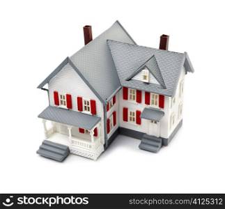 model of house isolated on white background, selective focus on nearest part