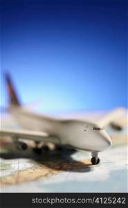 model on map, selective focus on nearest part of aircraft,