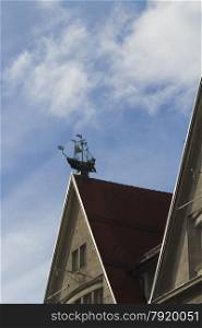 Model sailing ship on gable end of roof of Oberpollinger department store, Neuhauser Str, Munich, Bavaria, Germany, Europe.