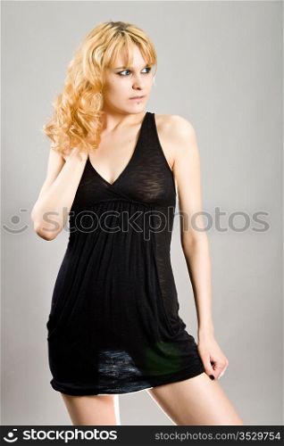 modeling girl in a black dress