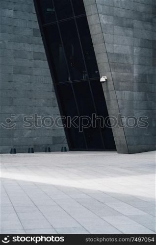 Modern and futuristic cement facade black wall and white floor