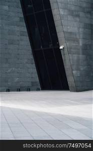 Modern and futuristic cement facade black wall and white floor