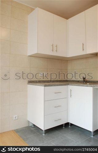 modern and small kitchen in white (wooden floor)